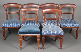 A harlequin set of 6 Victorian mahogany bar back dining chairs (5 and 1), with plain mid rails and over stuffed seats, upholstered in blue Berlin wool work, raised on turned supports 88cm h x 47cm w x 44cm d 