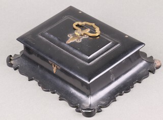 A Victorian cushion shaped black lacquered trinket box with hinged lid, the interior fitted a plush tray, raised on outswept panels 6cm x 23cm x 18cm 