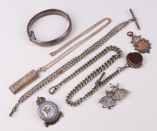 Two silver Alberts 1 with swivel seal, 2 fobs, an ingot and chain, bracelet and brooch, gross weight 158 grams 