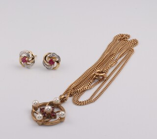 A pair of 9ct yellow gold ruby and diamond ear studs, together with a 9ct yellow gold necklace 54cm and a 9ct yellow gold ruby and seed pearl pendant 15mm, gross weight 6.1 grams 