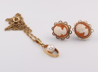 A yellow gold, testing as 14ct necklace 44cm, together with a 9ct yellow gold cultured pearl pendant and a pair of 9ct cameo ear studs gross weight 7.4 grams 