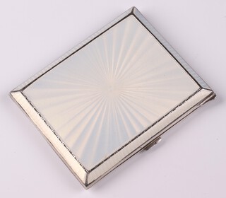 A lady's Art Deco silver and white guilloche enamelled cigarette case Birmingham 1939, 8cm x 6cm, engraved inscription, 92 grams 