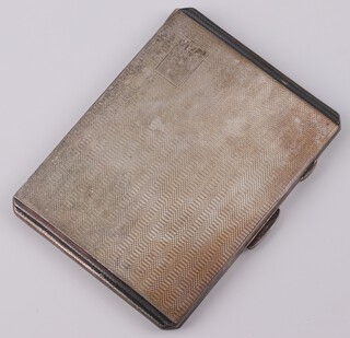 A rectangular silver engine turned cigarette case with engraved monogram Birmingham 1946 10cm x 8cm, 178 grams 