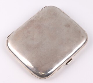 A silver cigarette case with sunburst decoration, Birmingham 1911, 9cm x 8cm, 100 grams 