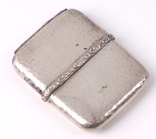 A Danish silver vesta with hammer pattern decoration and hinged half body, 32 grams, 5.5cm x 4.5cm 