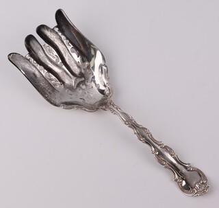 A Sterling silver asparagus server, with engraved monogram, 108 grams, 21cm 