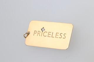 A 9ct yellow gold diamond set pendant, engraved "Priceless" 5.5 grams 