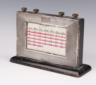An Art Deco engine turned silver desk top perpetual calendar with engraved inscription Birmingham 1936, 20cm 