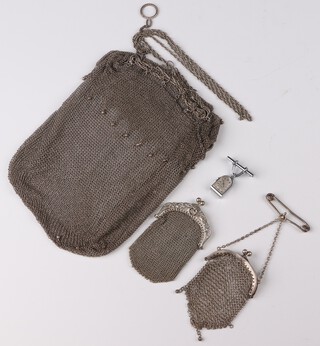 Three mesh purses and a lady's chromium nurses watch the dial inscribed Guvenia 