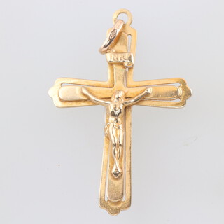 A 9ct yellow gold crucifix pendant 5cm, 3.3 grams 