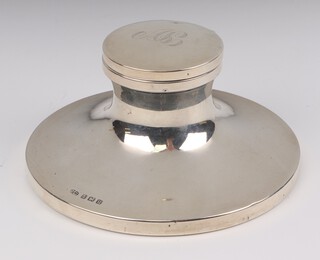 A circular silver capstan inkwell with engraved monogram Birmingham 1919, 12cm 