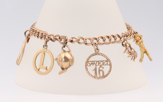 A 9ct yellow gold charm bracelet with 8 charms including wishbone, teapot, golfer, etc, with a 9ct padlock, 15.6 grams