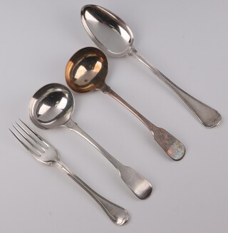 A pair of George III Old English pattern silver ladles London 1795,, a serving spoon and a dessert fork, 264 grams 