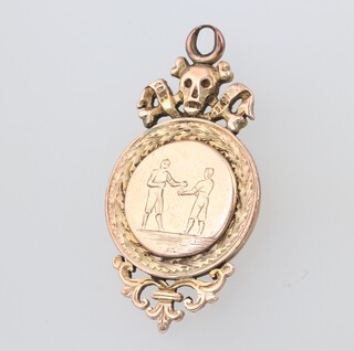 A 9ct yellow gold engraved boxing fob with skull and cross bone crest 17th Lancers Annual Boxing Competition 1904 Middle Weight Winner Pte C Adam 7.4 grams 