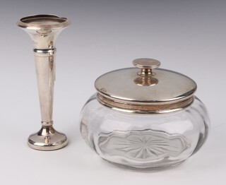 A circular silver mounted jar, Sheffield 1946, 13cm and a silver spill vase, rubbed marks 12cm 