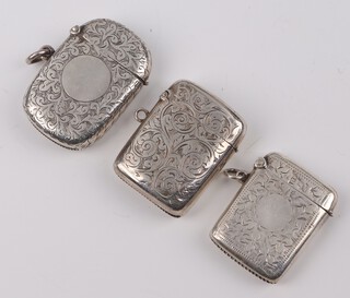 An Edwardian silver vesta, Birmingham 1892 and 2 others, 48 grams