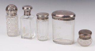A Victorian silver mounted glass bottle Birmingham 1893, 10cm and 4 other silver mounted bottles