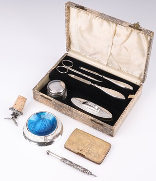 A silver mounted 5 piece manicure set, cased, Birmingham 1932, a dish, bottle stopper, pencil and cigarette case 