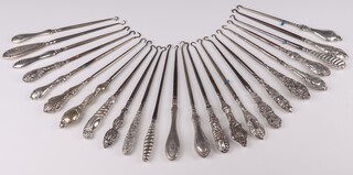 A Victorian silver handled button hook Birmingham 1900 and 23 others 