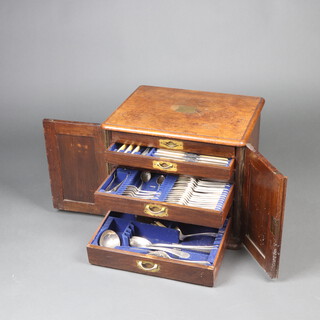 An Elkington & Co Gothic style walnut 6 drawer canteen containing a part canteen of engraved pattern flatware with monogram (140) 