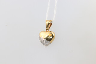A yellow gold, testing as 18ct diamond set heart pendant, 4.3 grams 