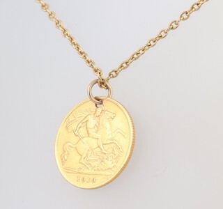 A 1913 half sovereign, drilled, on a 9ct yellow gold 46cm chain, the chain weighs 3.1 grams