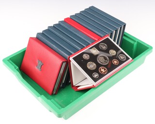 Thirteen United Kingdom Proof coin sets 1985, 1987 (x2), 1988, 1989 (x2), 1990-1994, 1997, 1999 