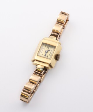 A lady's 14ct yellow gold wristwatch and bracelet, the dial inscribed Huber, 17mm (not working), 18.1 grams 