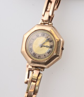 A lady's 9ct yellow gold octagonal wristwatch and bracelet, 25.3 grams gross including movement, glass and springs, (not working) 