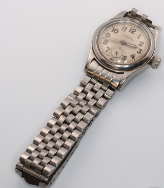 An Oyster Junior Sport steel cased wristwatch with seconds at 6 o'clock  on a Rolex steel bracelet (a/f), 31mm (not working) 