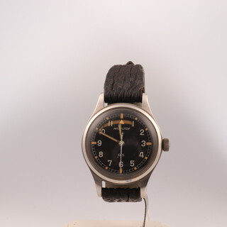A gentleman's steel cased Hamilton wristwatch with black dial inscribed GS, the case engraved Tropicalised 75003/3 no.684 (this watch was given to British Commonwealth employees for general service in the 1960's and 70's, it is in working order) 35mm