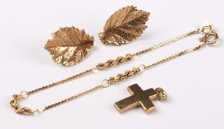 A pair of 9ct yellow gold leaf ear studs, a bracelet 18cm and a cross pendant, 5.3 grams 