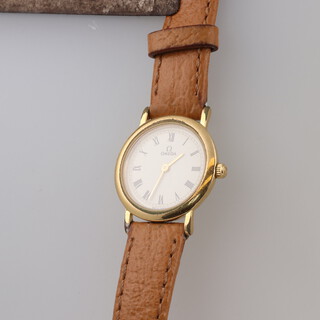 A lady's gilt cased Omega De Ville quartz wristwatch 20mm (not working)