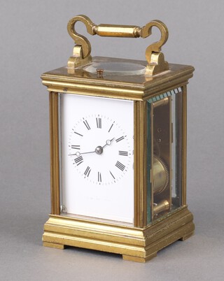A French 8 day striking carriage clock with 6cm dial, contained in a gilt metal case, the back marked GL1316 12cm x 8cm x 7cm 