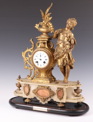 A 19th Century French mantel clock with 8cm enamelled dial, Roman numerals, contained in a gilt painted spelter and white marble case with bird finial, on an oval ebonised base, presented to Mr and Mrs Hogg as a token of esteem by their friends Rawdon Low Mill 1876, complete with pendulum and key