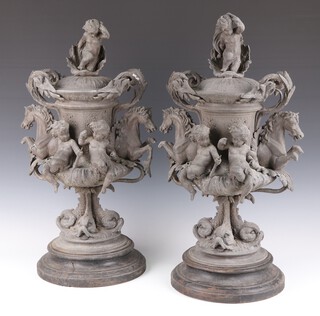 A pair of large and impressive Victorian spelter twin handled urns, the finial in the form of a cherub, shell and ribbon, the handles in the form of horses, raised on dolphin supports 60cm h x 33cm diam. 