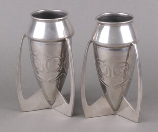 Archibald Knox for Liberty, a pair of Arts and Crafts Tudric Pewter bombe shaped 3 handled vases, 19cm, both bases numbered 0226  