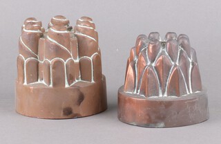 Benham, a copper ring jelly mould, numbered 400 and with orb mark 11cm x 12cm (slightly misshapen to the bottom) and 1 other copper jelly mould 12cm x 12cm 