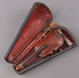 A 19th Century carved wooden model of a violin 10cm