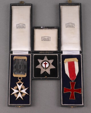 Masonic, a Knights Templar gilt and enamel Knights breast star, a silver plated and enamelled jewel and a Knights of Malta gilt metal and enamelled jewel, all cased