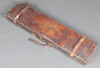 Cogswell and Harrison, a leather shot gun case with brass mounts, the lid marked G E Griffiths, fitted for 1 gun, the interior labelled Cogswell and Harrison London 9cm x 88cm x 22cm 