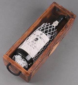 A bottle of Warre's 1987 Quinta da Cavadinha vintage port, in wooden box 