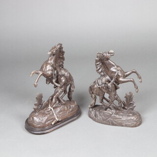 A pair of Victorian spelter figures of Marly horses 44cm 