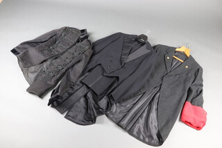 A Victorian captains tunic, labelled Harman and Co. Calcutta, formerly worn by Lieutenant Colonel Joscelyn Theodore Hosburgh Lane OBE 1880 to 1954, commissioned in 1900 and 1920, served with the 39th Garhwal Rifles, together with an evening tail coat and trousers by Watts, Christie and Co. and a theatrical grey tail coat with red cuffs (slight moth to back)