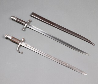 A Portuguese M1885 Kropatschek bayonet, the cross bar numbered A991 and 1 other bayonet