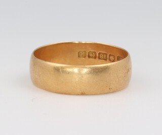 An 18ct yellow gold wide wedding band size W, 6.8 grams 