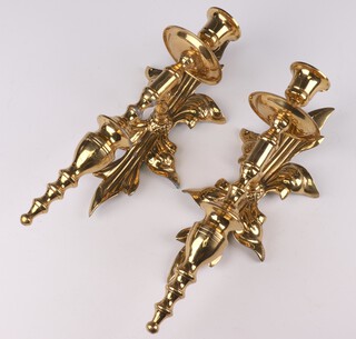 A pair of gilt metal wall mounted candlesticks 29cm x 10cm 