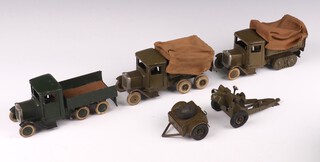 Britains Toys, a collection of vehicles to include a 1432 covered ten wheel tender, a 1433 covered ten wheel caterpillar tender, a 1335 six wheeled Army lorry, a field gun and a limber, all vehicles have drivers
