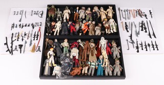 Palitoy, a large collection of original vintage Star Wars figures circa 1977 to 1984 (some broken), together with a collection of weaponry, to include Mail Away Emperor in plastic packaging (opened) and Anakin Skywalker 
