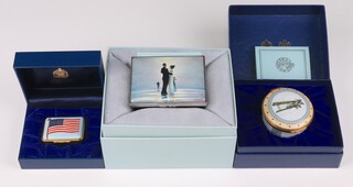 A Halcyon Days enamelled Royal Flying Corps box no.155 of 250, 6cm, boxed, a ditto Jack Vettriano Dance Me To The End of Love no.182 of 350 dated 2004 8cm, boxed and a ditto God Bless America, We Remember September 11 2001 4cm, boxed 